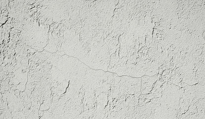 Obraz premium White textured wall surface with cracks and uneven plaster.