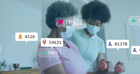 Caregiver guiding senior to curl pose, senior lifting weights in rehab floating social icons rising