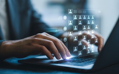 Fototapeta premium Person typing on laptop with digital people icons hands