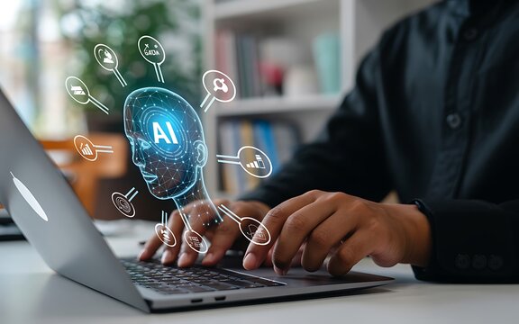 Person typing on laptop with ai hologram image