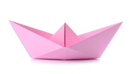 Pink paper origami boat on white