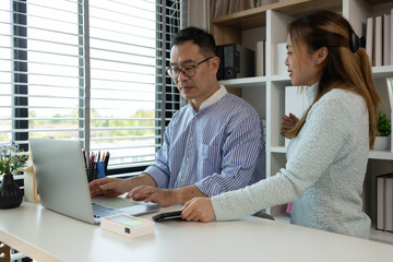 a father and daughter are spending their free time together at home, the daughter spends her weekend visiting her elderly father, a family full of love between a father and daughter