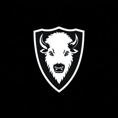 Obraz premium Buffalo head centered on a shield, simplified, monochrome vector