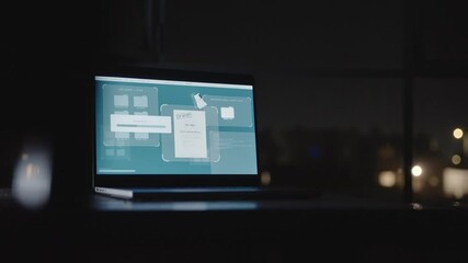 Laptop computer copying top secret documents and files into remote folder. Dark night in office desk as spyware is uploading sensitive data archive or robbing classified papers stored by secret agency - Powered by Adobe