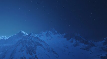 Serene night landscape showcasing snow-capped mountain peaks under a starlit, deep blue sky