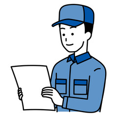 書類を見るつなぎ作業服の男性