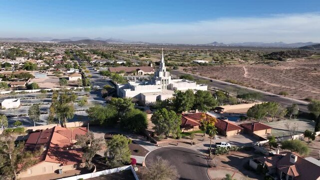 Aerial view of temple and mountains in suburb, United States.