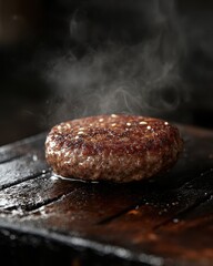 Freshly Cooked Hamburger Patty on Dark Wooden Surface with Steam