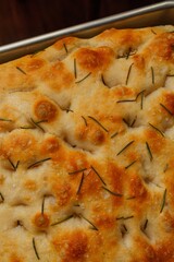 freshly baked rosemary Focaccia bread in baking pan