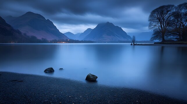 Serene Twilight Lake Landscape: Mountains, Trees, and Calm Waters