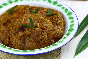 Kue Cucur, Indonesian traditional cake, made from rice floor, palm sugar. Popular street food in...