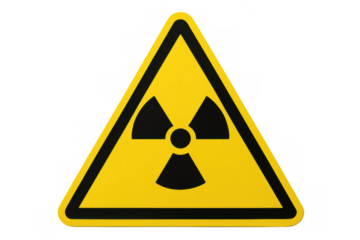 Radioactive warning symbol displaying international ionizing radiation trefoil marking nuclear hazard on bright yellow triangular signage