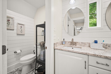 Spa-Inspired Bathroom with Elegant Fixtures and Soft Lighting