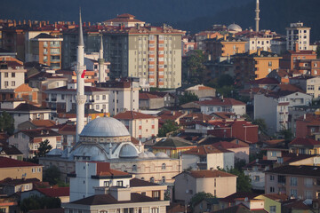 Mosque surrounded by urban landscape at dawn in Turkey