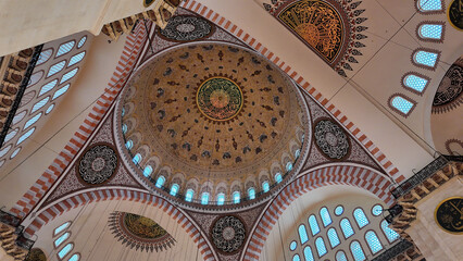 Intricate ceiling details of an ornate mosque interior