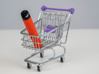 Disposable vape in a customer's cart.
