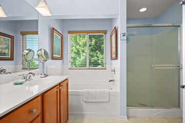 Spa-Inspired Bathroom with Elegant Fixtures and Soft Lighting