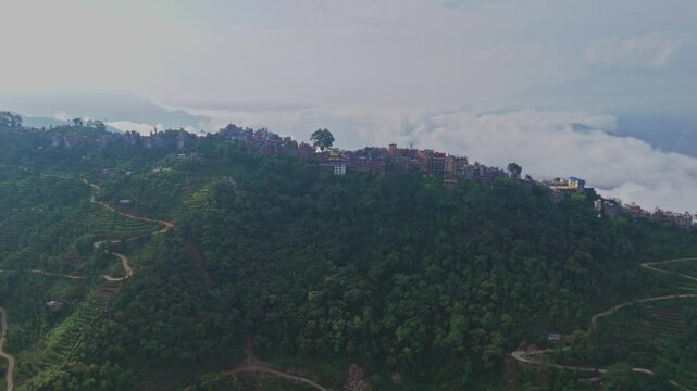 Manakamana Temple, located on a hilltop in Gorkha, Nepal, is a revered Hindu site accessed by cable car. Pilgrims visit to offer prayers and enjoy scenic views of the surrounding mountains and valley.