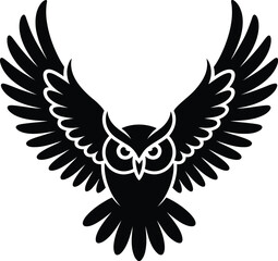 Black owl with spread wings flying
