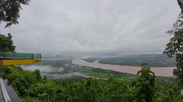 Panoramic view of the Mekong River, Wat Pha Tak Suea, a viewpoint for the sea of ​​mist, a thrilling Skywalk on the cliff, Sangkhom District, Nong Khai Province, Thailand