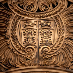 Close-up of an ornate baroque-style metal relief 