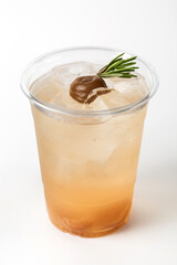 Refreshing Beverage in Clear Cup with Ice and Garnish on Top