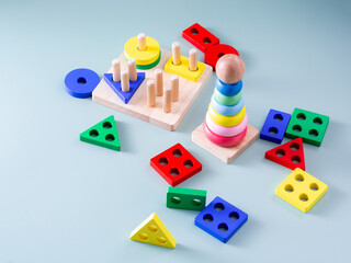 Obraz premium Colorful Wooden Toys for Kids with Shapes and Stacking Fun