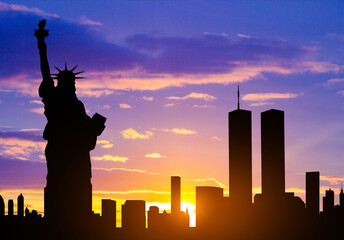New York skyline silhouette with Towers and Statue of Liberty against the sunset. Patriot Day...