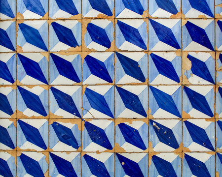 Colonial tiles, decorated with geometric patterns, blue and white on the facade of a colonial residence in the city of Viana, MA, Brazil.