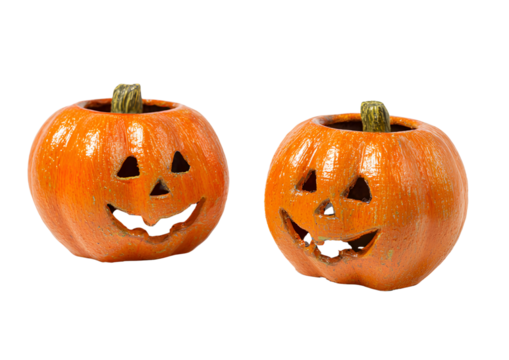 Classic carved pumpkin face with a mischievous grin and glowing eyes in a Halloween themed design PNG, transparent background