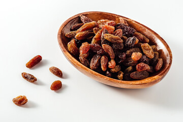Assorted Dried Fruits in Wooden Bowl on White Background