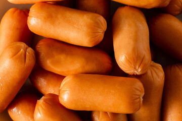 Close-Up of Fresh Sausages Piled on a Surface for Culinary Use
