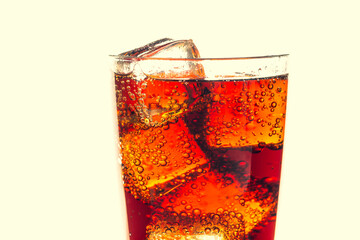 Refreshing Dark Soda with Ice Cubes in a Clear Glass