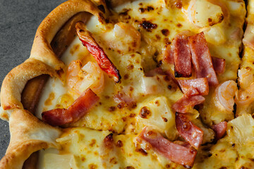 Delicious close-up of cheesy pizza with toppings and crispy crust