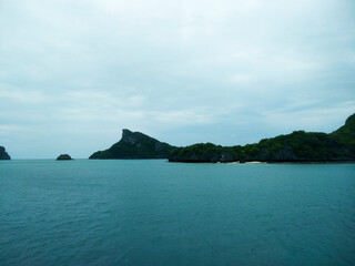 Beautiful Seascape with Mountains, Blue Ocean, and Islands under Clear Sky at Ang Thong National Marine Park, Koh Samui, Thailand