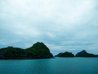 Beautiful Seascape with Mountains, Blue Ocean, and Islands under Clear Sky at Ang Thong National Marine Park, Koh Samui, Thailand