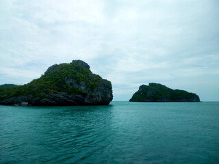 Beautiful Seascape with Mountains, Blue Ocean, and Islands under Clear Sky at Ang Thong National Marine Park, Koh Samui, Thailand