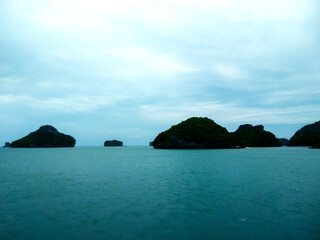 Beautiful Seascape with Mountains, Blue Ocean, and Islands under Clear Sky at Ang Thong National Marine Park, Koh Samui, Thailand