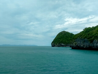 Beautiful Seascape with Mountains, Blue Ocean, and Islands under Clear Sky at Ang Thong National Marine Park, Koh Samui, Thailand