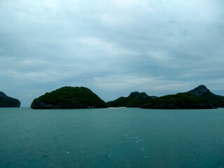 Beautiful Seascape with Mountains, Blue Ocean, and Islands under Clear Sky at Ang Thong National Marine Park, Koh Samui, Thailand