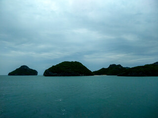 Beautiful Seascape with Mountains, Blue Ocean, and Islands under Clear Sky at Ang Thong National Marine Park, Koh Samui, Thailand