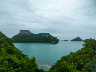Beautiful Seascape with Mountains, Blue Ocean, and Islands under Clear Sky at Ang Thong National Marine Park, Koh Samui, Thailand