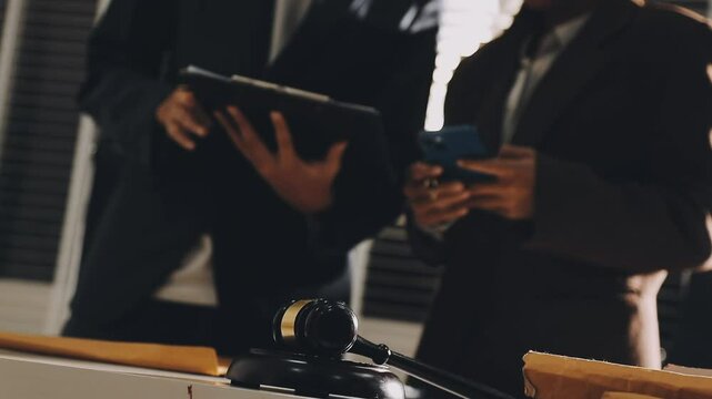 Concept of legal counseling. The lawyer or legal counsel is listening and providing advice to business people.