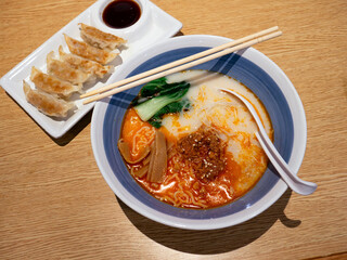 Tan Tan Ramen a spicy tasty Japanese ramen noodle soup and Gyoza a Japanese and Chinese fried...