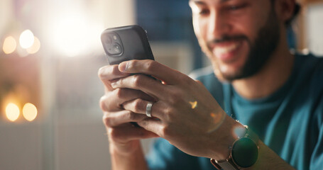 Happy man, typing and social media with phone for online chatting, conversation or network in home....