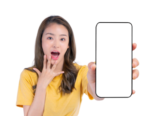 Surprised Asian woman holding and showing blank smartphone screen in hand, amazed facial expression, isolated on a transparent background. Mockup mobile display with copy space for app or website