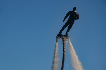 Giżycko, Masuria, Poland , may 01.2025 , flyboard on Lake Niegocin in Giżycko