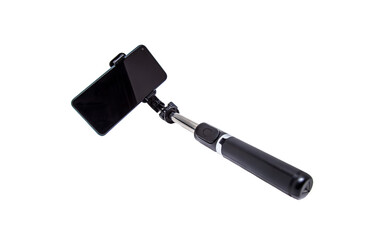 Selfie stick with phone on white background