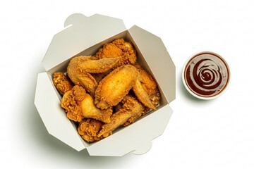 Fried Chicken Wings with Barbecue Sauce in Takeout Box – White Background