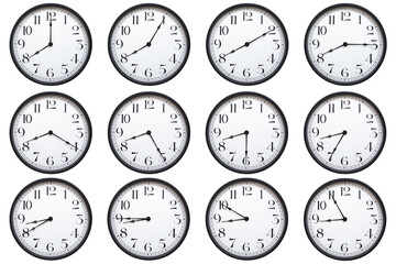 A set of classic round analog wall clocks with black frames and bold numbers, each showing a...